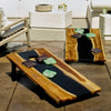 Image of Uttermost Clearwood Cornhole Game Set - Natural Teak, Black, Set of 2